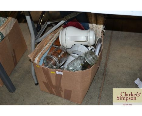 A box containing an enamel jug; storage jars; a thermos jug etc