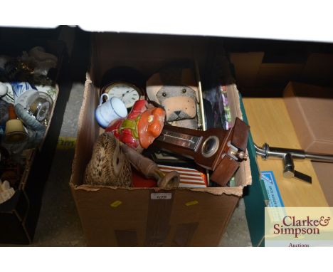A quantity of miscellaneous ornaments and a modern barometer; a battery operated mantel clock etc