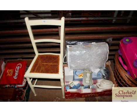 A wicker based chair; wallpaper; light bulb; and seat cover