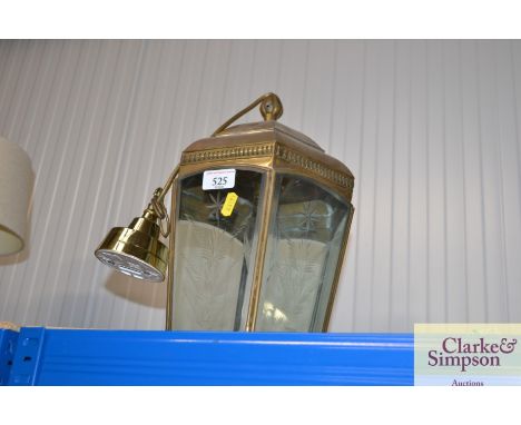A brass and glass hall light