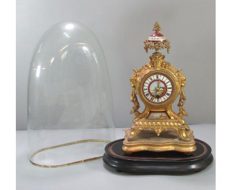 19th century French gilt metal porcelain mounted balloon shaped mantle clock, having urn shaped foliate finial above porcelai