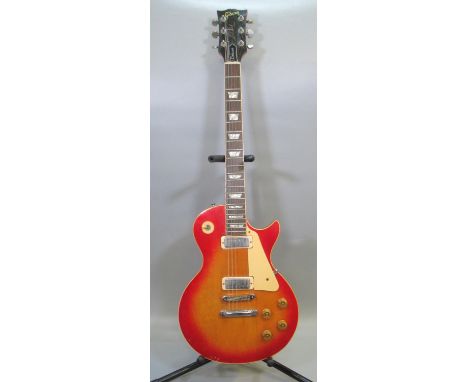 Vintage 1979 Gibson Les Paul Deluxe electric guitar, serial number 70549670, made in the USA. Maple, cherry red sunburst body