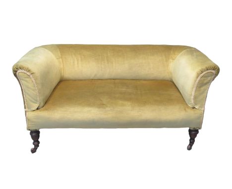 Late Victorian upholstered two seater bedroom or parlour sofa, the low back and shaped arms above mahogany vase shaped front 