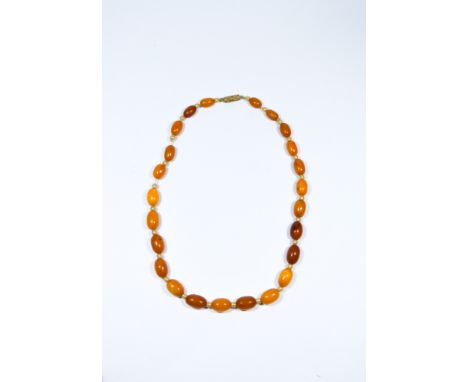 Vintage row of amber beads - some butterscotch colour, weight 16.5 grams