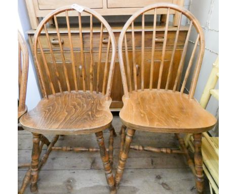 A set of four stick back Windsor dining chairs 