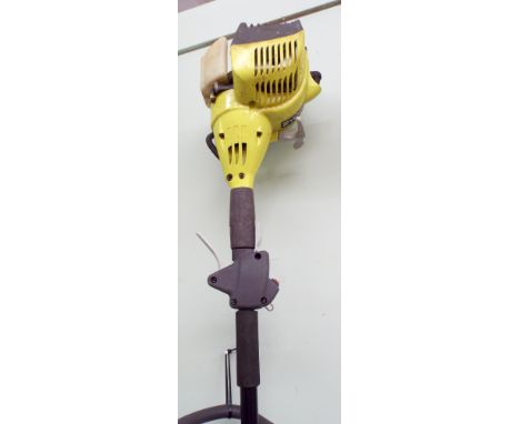 A Ryobi petrol engine strimmer