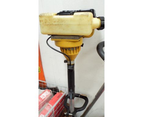 A Kober petrol engine strimmer 