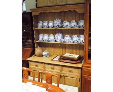 A Victorian style stripped and waxed pine Welsh style dresser with shelf back three drawers and cupboards under 53" wide  