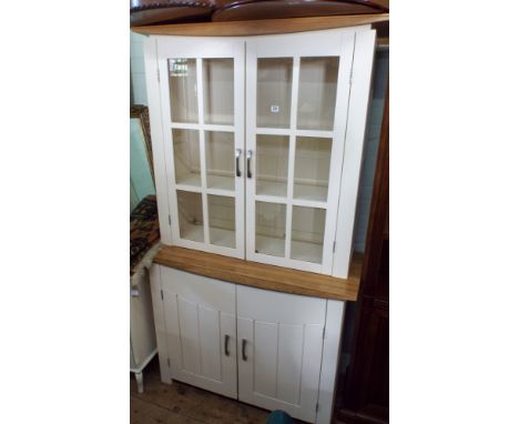 A white painted and light oak glazed kitchen dresser with cupboards under, 43" wide and matching the table and chairs 