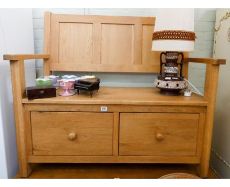 A light oak hall seat fitted two large drawers 3'6 wide 