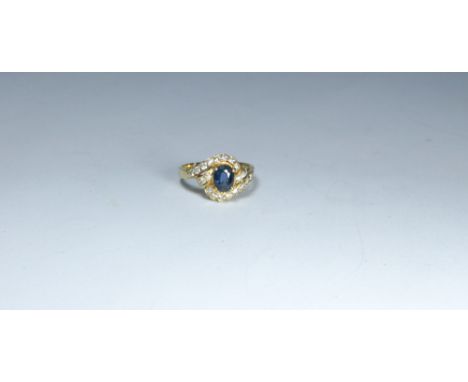 18ct yellow gold sapphire and diamond oval cluster ring, ring size K 