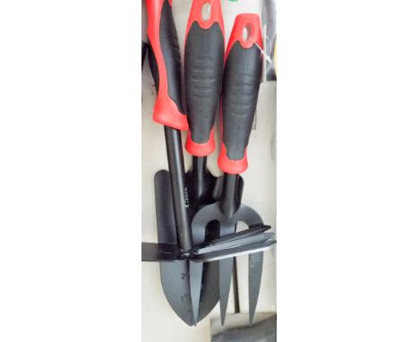 A new heavy duty garden hand trowel, hand fork and hand weeder 