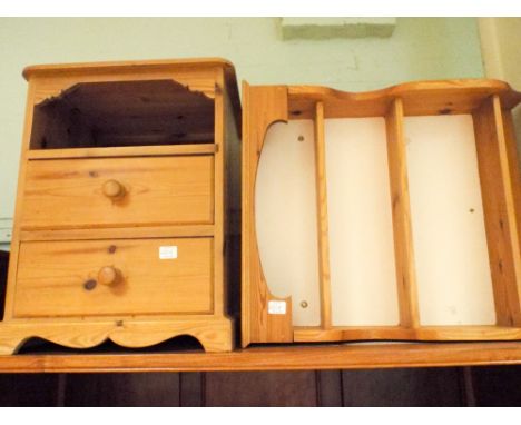 A modern pine bedside cabinet fitted two drawers and a small hanging wall shelf 