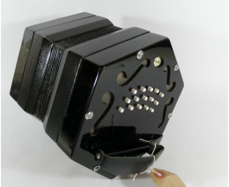 A Rochelle 15 button concertina with soft carry case