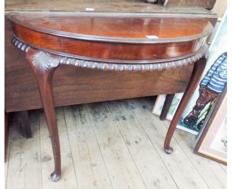 Semi circular mahogany console table on cabriole front legs 
