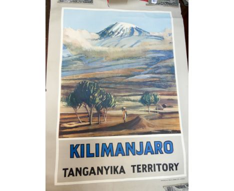 A vintage advertising poster for Kilimanjaro in the Tanganyika territory together with a vintage ordnance survey geological m