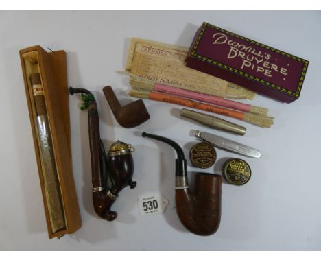 A small collection of smoking related items to include a cigar pipe knife and engraved pipe with the details Sir D E Forwood 