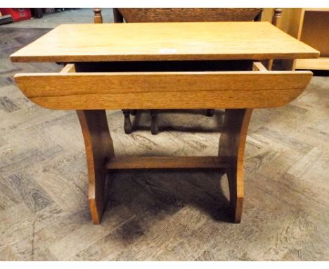 A light oak refectory style coffee table fitted drawer 