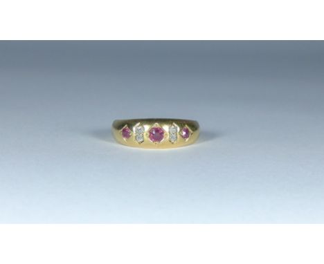 Victorian 18ct yellow gold ruby and diamond half hoop ring, ring size K, gross weight 3.4 grams