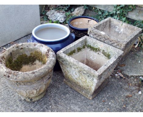 Two reconstituted stone square garden planters, on circular garden planter and two round ceramic garden planters 