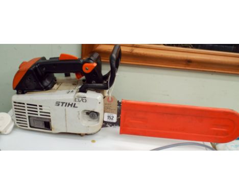 A Stihl petrol engine chain saw, works but leaks oil 