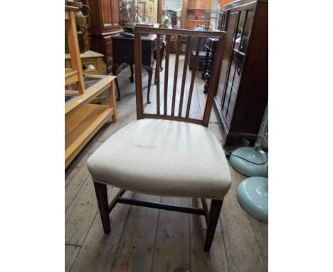 Three matching stick back mahogany dining chairs and one odd Hepplewhite style chair 