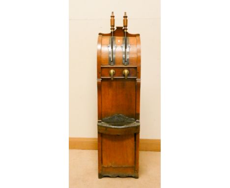 A set of antique walnut framed beer engine pumps 128cms tall