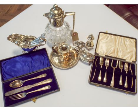 A glass and plated claret jug, cake forks, christening set, chamber stick, condiments etc 