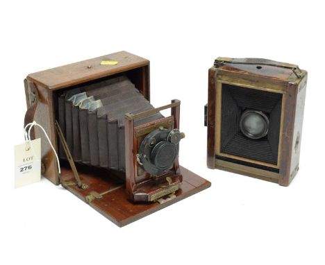 A mahogany Pony Premo B 1/4 plate camera; another view camera; and a Dallmeyer wide angle lens, in box.