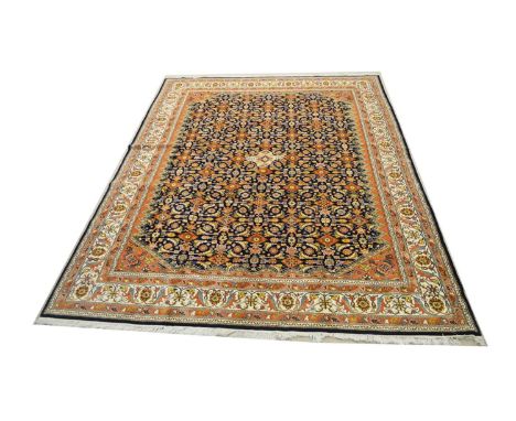 A Bidjar carpet, with repeated floral decoration, 408 x 322cms.