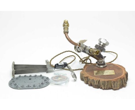 An Avro Vulcan Olympus 202 engine part desk lamp, with applied brass title plaque and Certificate from the Vulcan to the Sky 