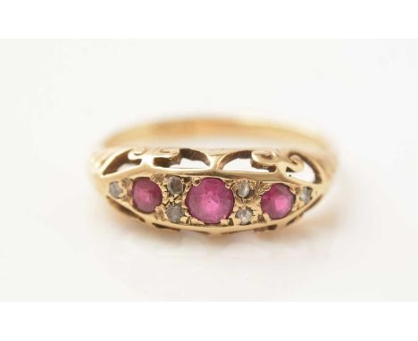 A ruby and diamond ring, in 18ct yellow gold Victorian style mount and shank, ring size N, 3.4g gross.