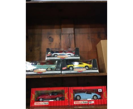 Three Ertl 1:8 scale American Muscle Die Cast cars and two 1:16 scale Tonka Polistil Die Cast cars, boxed