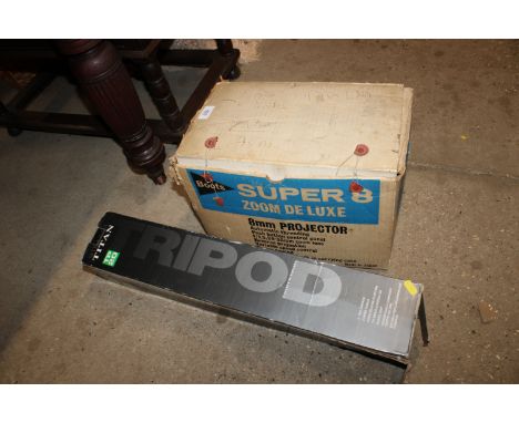 A Boots Super8 zoom deluxe projector together with a camera tripod in original box. Sold as a collectors item