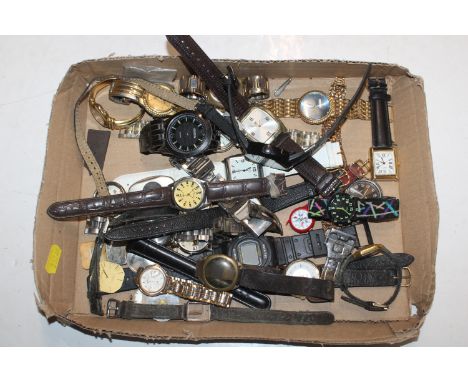 A box of vintage and other wristwatches