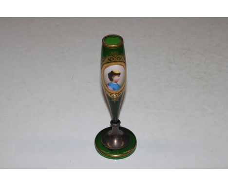 A green glass spill vase decorated with a portrait panel and having white metal mount 