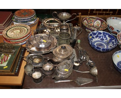 A quantity of various silver plated ware to include teapots, bottle coaster, twin handled trays, wine funnel, flatware etc.