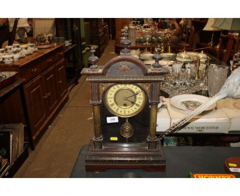 A single hole mantle clock with key and pendulum 