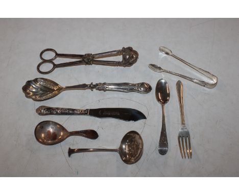 A pair of silver sugar tongs, a silver fork, a silver spoon, approx. total weight 52gm, a silver plated caddy spoon, a sifter