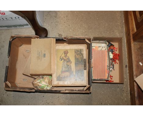 A box containing farmyard animals, building blocks and vintage puzzles