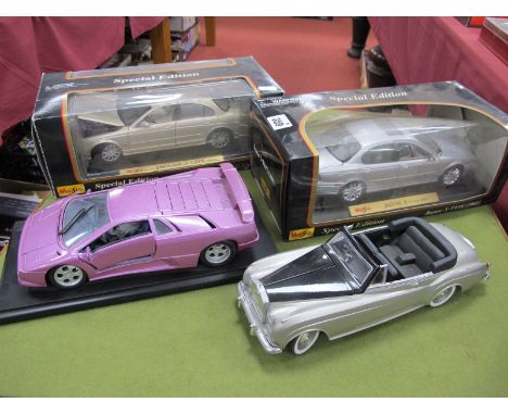 Four Boxed 1:18th Scale Diecast Model Vehicles, by Maisto, Solido, Gwilo, including Maisto Jaguar S Type, X Type, Solido #800