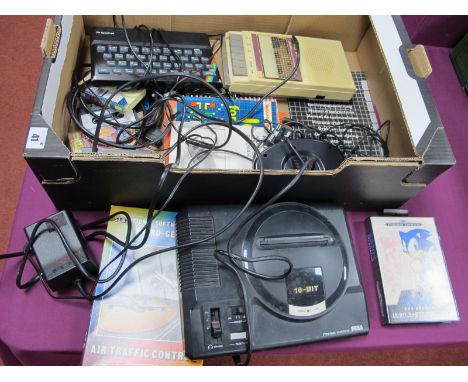 A Sinclair ZX Spectrum Home Computer, literature Bush audio cassette recorder, software, together with a Sega Mega Drive gami