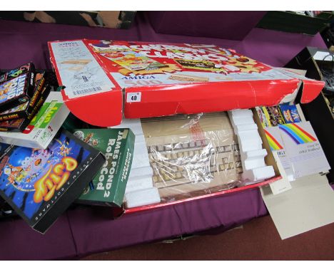 A Boxed Commodore Amiga A-500, plus home computer, S/N 043237, Cartoon Classics Edition, including Captain Planet and The Pla