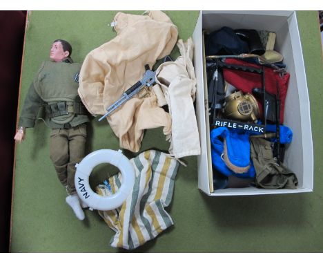 A Circa 1960's Action Man, hard plastic head with brown painted hair, brown eyes, scar to cheek, masking tape to both feet/an