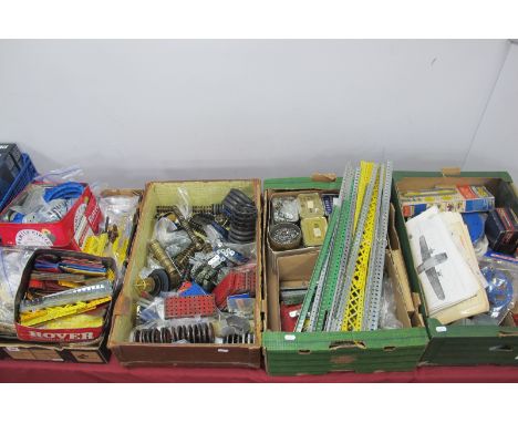 Contents of a Meccano Enthusiasts Workshop, components include clockwork and electric motors, girders, metal strips, brackets