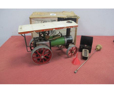 A Boxed Mamod TEI Traction Engine 'Live Steam', steering rod, burner and funnel present, model has been steamed, some corrosi