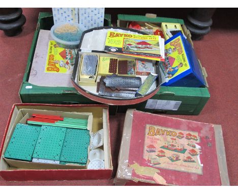 A Quantity of Bayko Building Set Components, including bases, roofs, walls, windows, corner bricks, balustrades, rod, literat