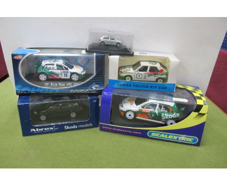 A Scalextric #C2645 Skoda Fabia WRC Slot Car, Colin McRae, Scalextric Enthusiasts Club 2006, cased; together with four diecas