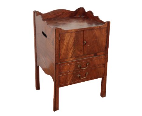 A GEORGE III MAHOGANY TRAY-TOP COMMODE the galleried top above panelled doors, an apron drawer below, containing a commode on