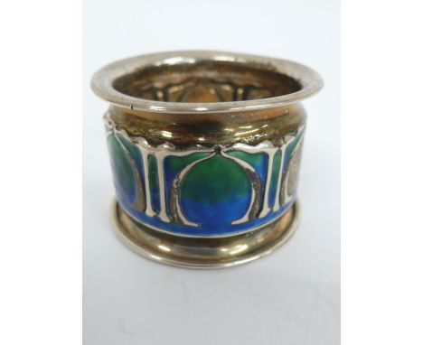 An Archibald Knox inspired Design silver and blue/green enamel napkin ring London 1903 maker Alstons &amp; Hallam 